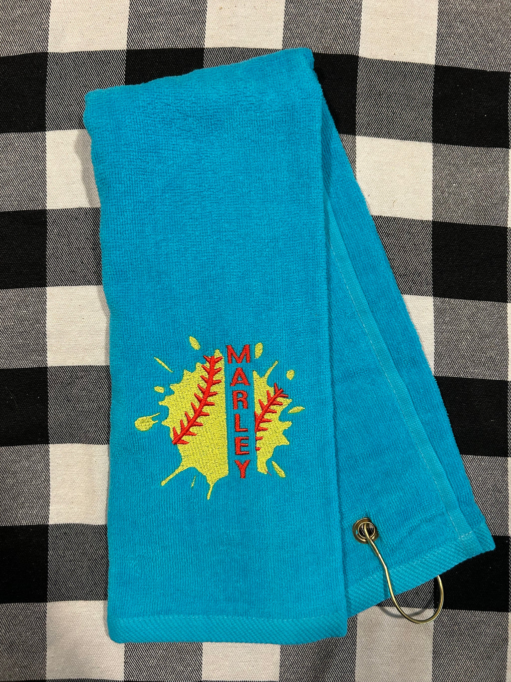 Softball towel with grommet