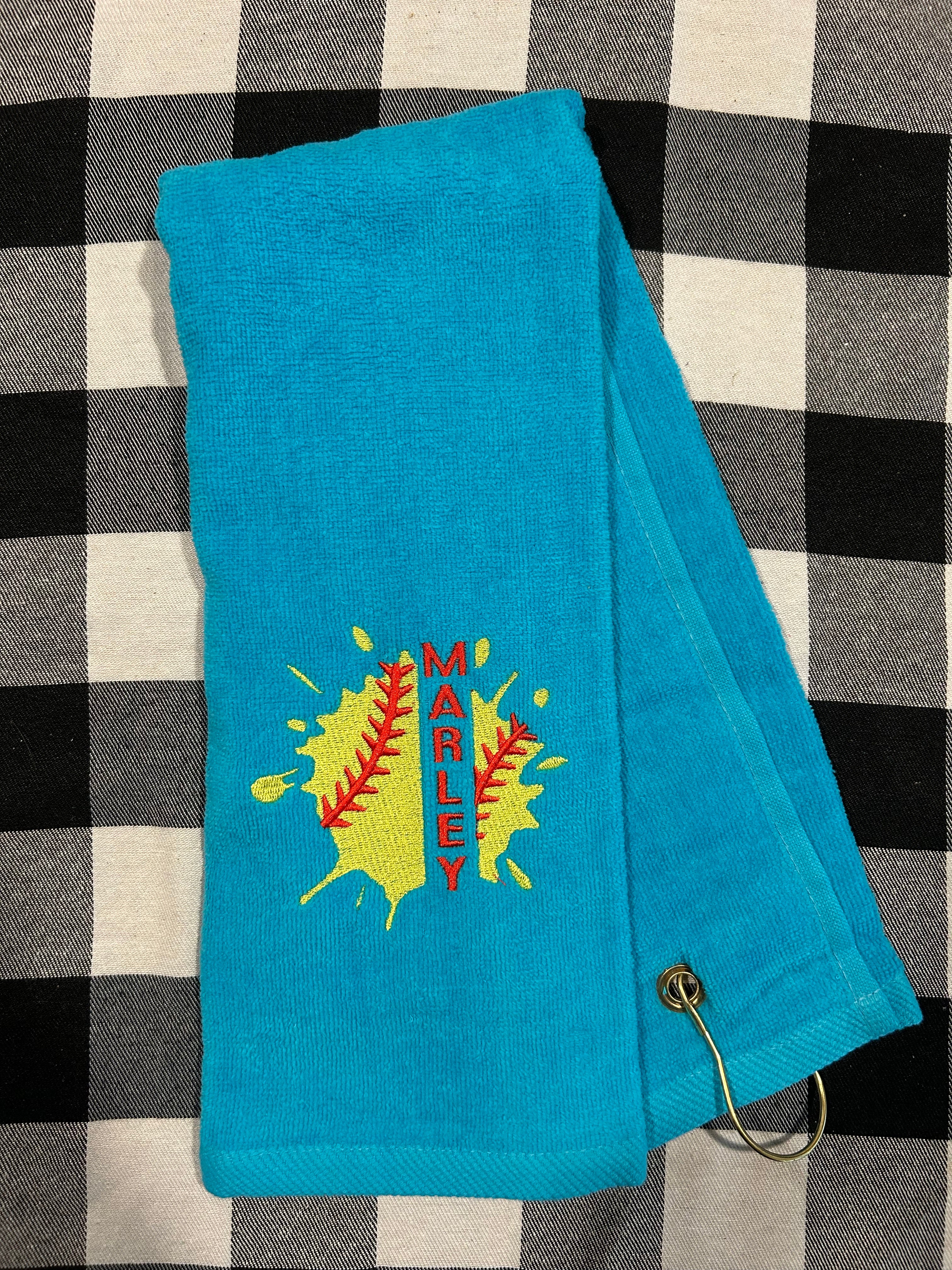 Softball towel with grommet